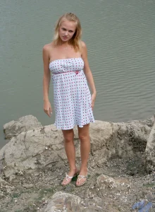 Busty chick and lake view