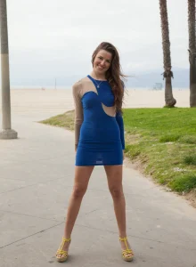 Exciting baby in blue dress flashing young ass outside
