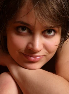 Nude baby with stretching nipples