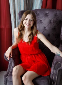 Playful puffy nipples chick in red dress and red high heels