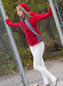 Sweet blonde goes nude outdoor in white spandex