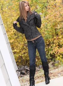 Tasty young blonde outdoor in tight denim jeans and nude showing fresh slim body with puffy nipples